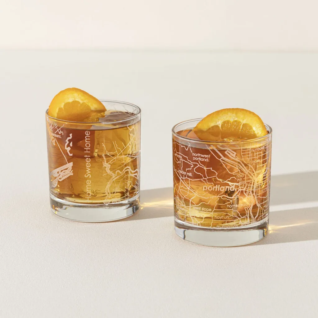 Personalized hometown map glasses featuring a custom city street map